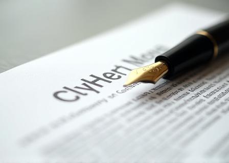 Close-up of a professionally drafted legal contract with a fountain pen